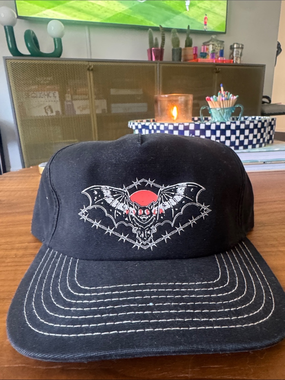 VISSLA Black Hat with Bat and Red Sun Graphic